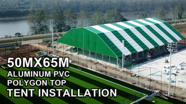 Video zur Montage eines 50 m x 65 m großen Zeltes mit polygonaler Dachkonstruktion aus Aluminium und PVC